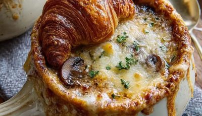 Anti-Inflammatory French Onion Soup with Mushrooms, Extra Herbs & Cheesy Croissant Topping